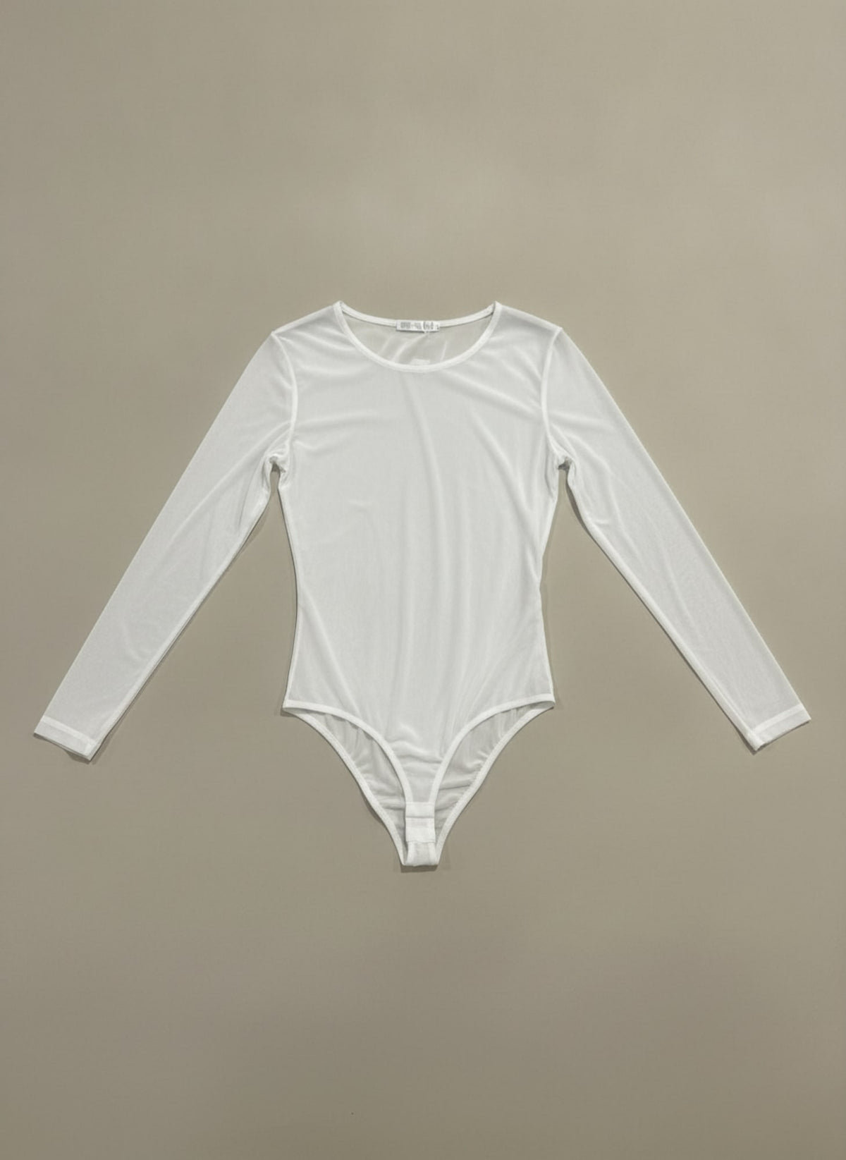 BODY IN TULLE A MANICHE LUNGHE Bianco - still life - IRONICA
