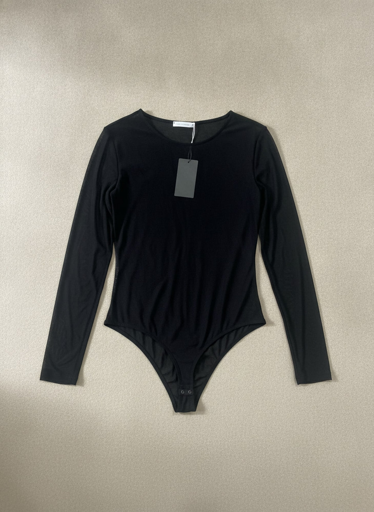 BODY IN TULLE A MANICHE LUNGHE Nero - still life - IRONICA