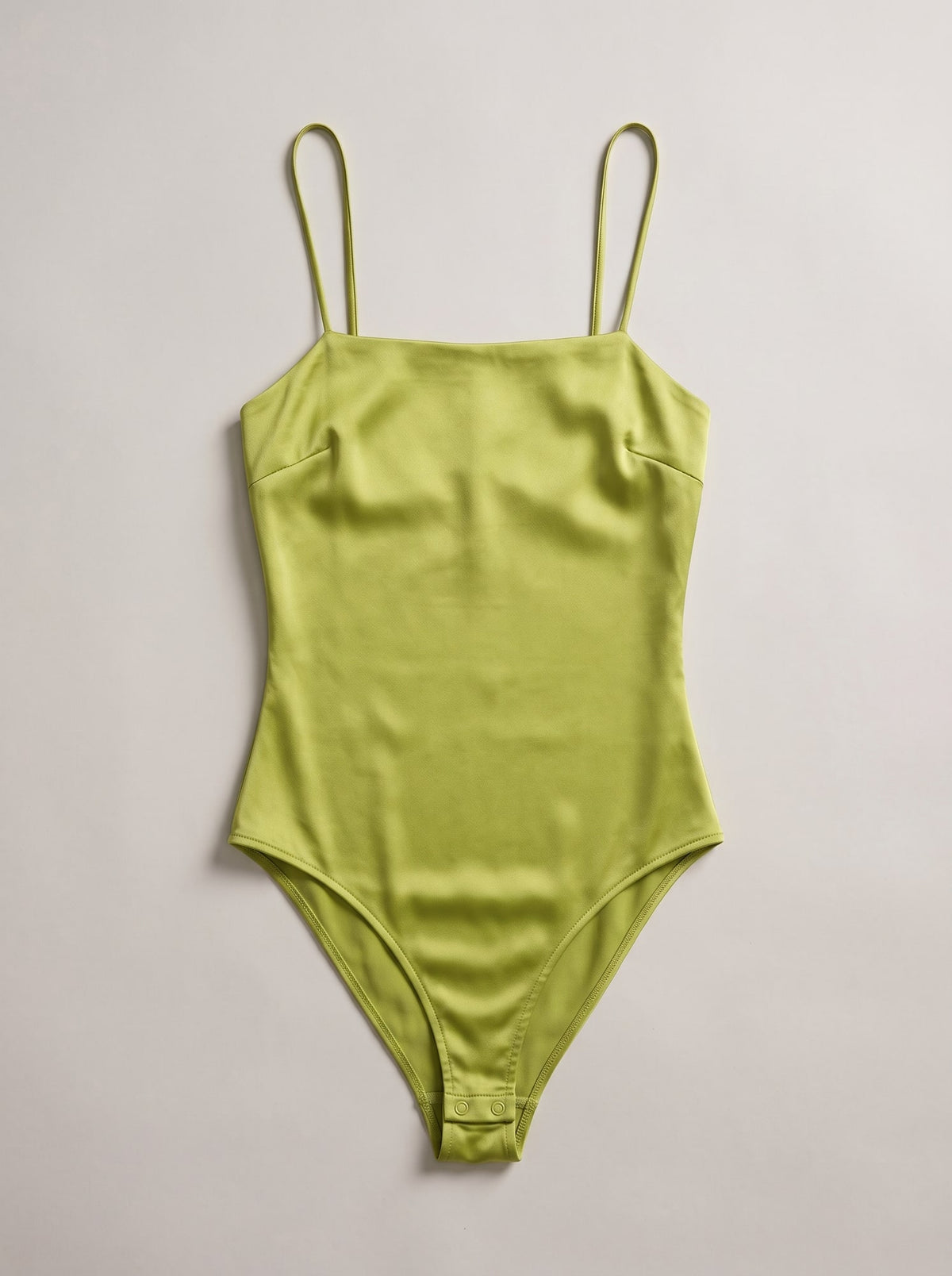 BODY SATINATO CON BRETELLE Pistacchio - still life - IRONICA