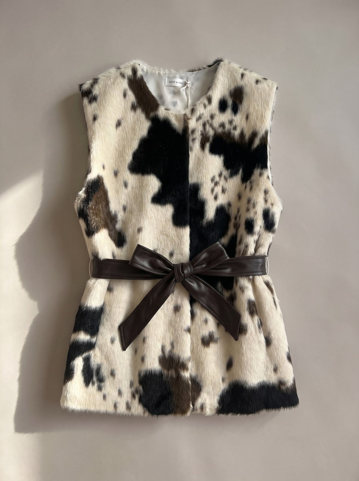 GILET IN ECOPELLICCIA CON CINTURA Avorio - still life - IRONICA